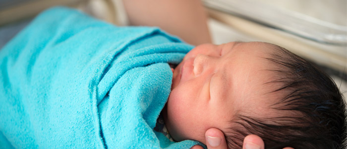 Newborn-Baby-in-Bassinet